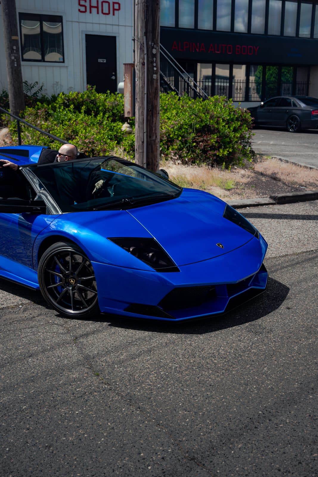 Alpina Auto Body shop in Sellwood, Southeast Portland, the owner's blue Lamborghini Murcielago out front