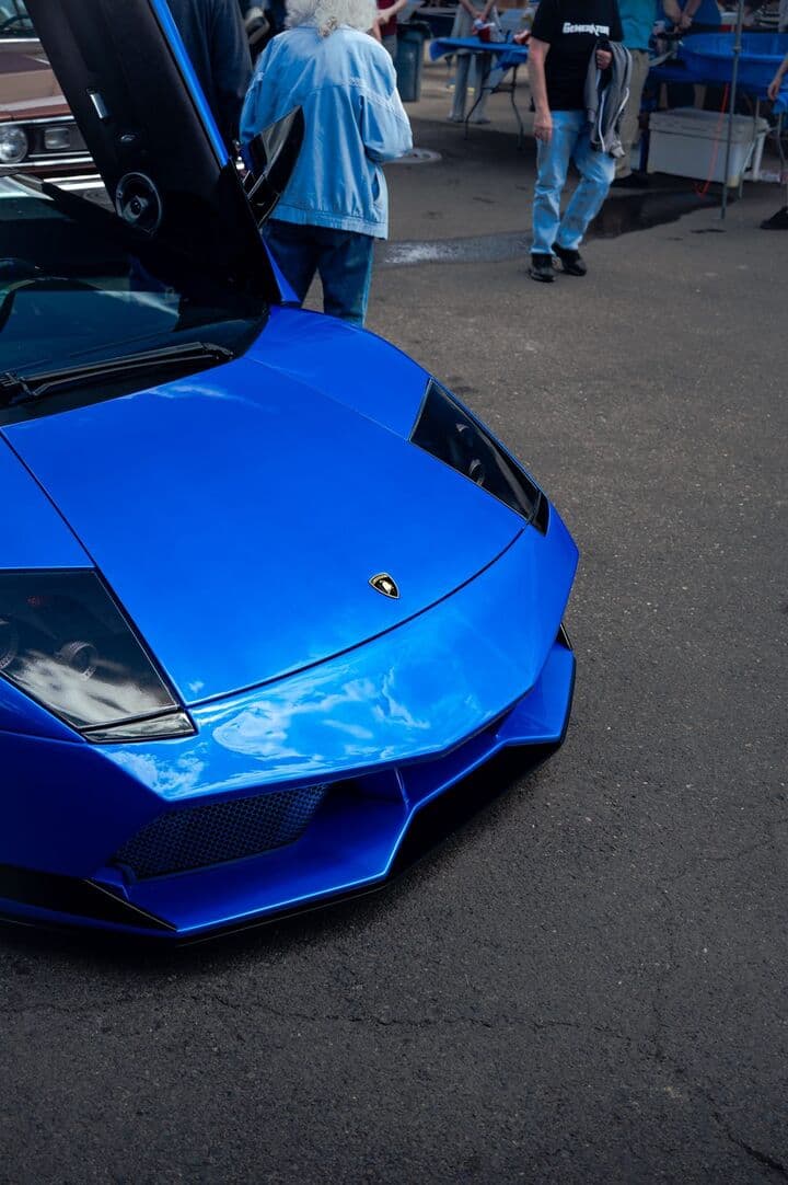 Deep blue custom paint on a Lamborghini Murcielago, refinished at the Alpina Auto Body custom paint shop in Southeast Portland